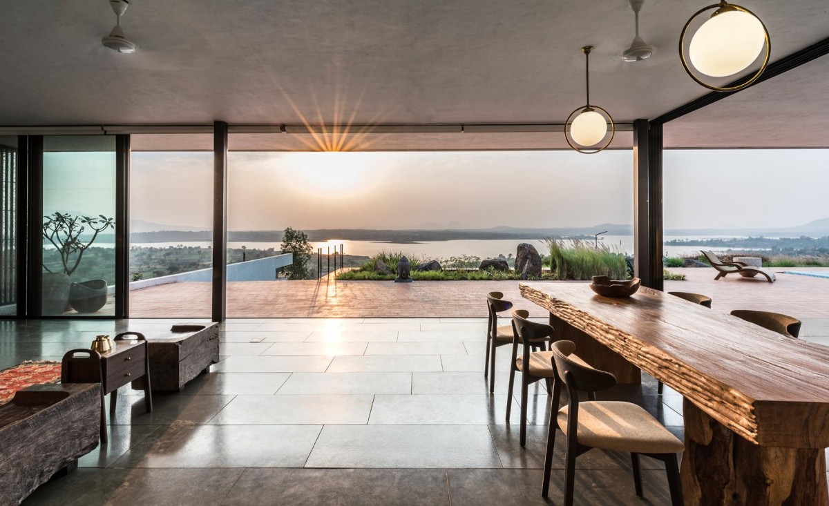 Outside view from living of House with the Soaring Rock by SPASM Design Architects