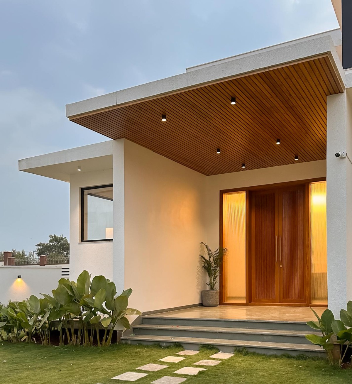 Dusk light shot of entrance of The House of Frames by KalaaZodh Architecture