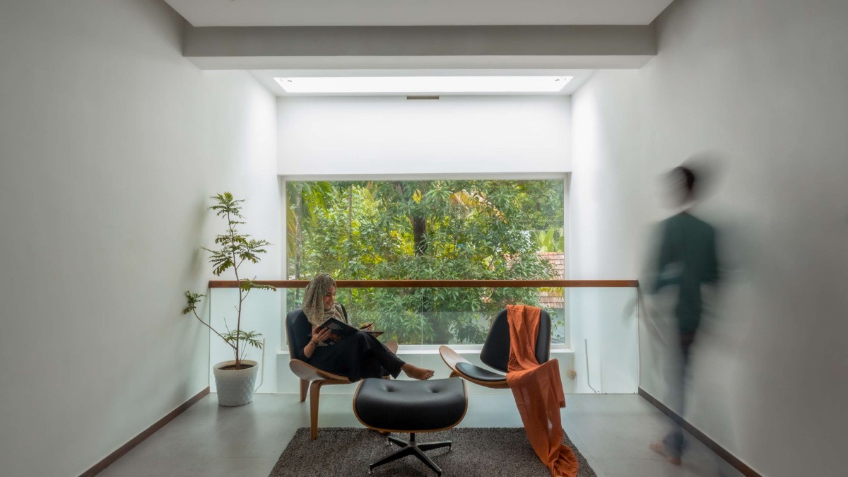 Seating area at balcony of Mount Residence by Equilibrio Designs