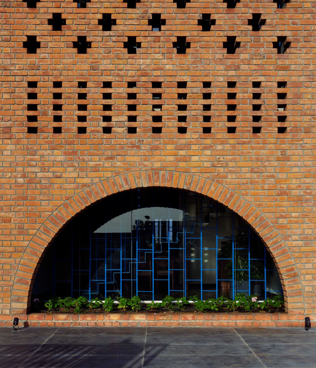 Brick Wall and Front Courtyard of Within Cuboids by Alok Kothari Architects