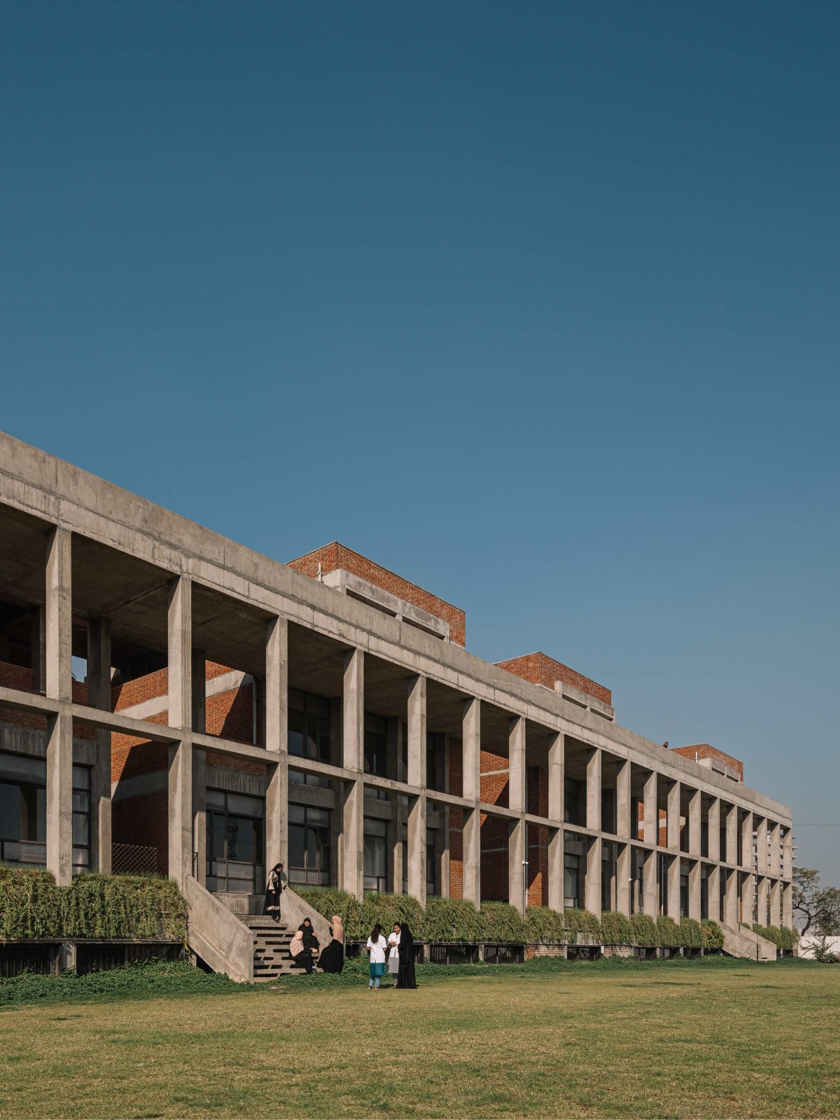 Exterior view of Girl’s college & hostel for Model education trust by Neogenesis+Studi0261