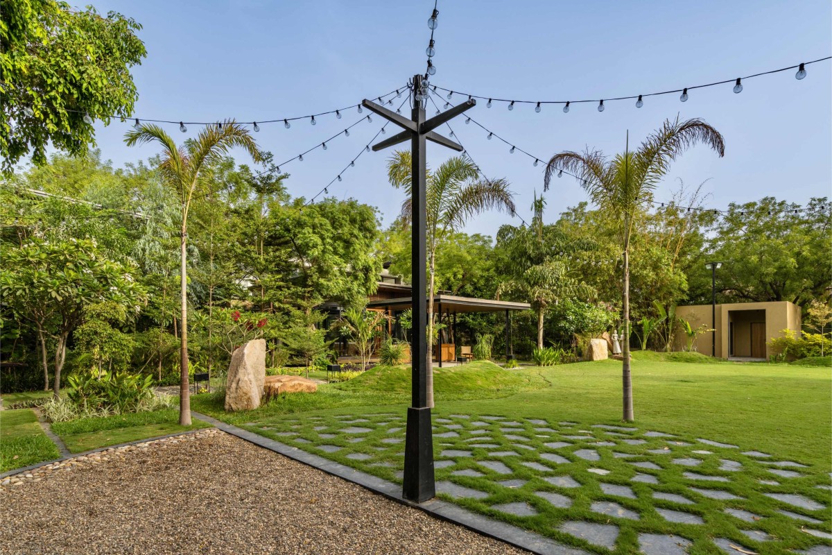 Lawn of Kalrav Villa by VPA Architects