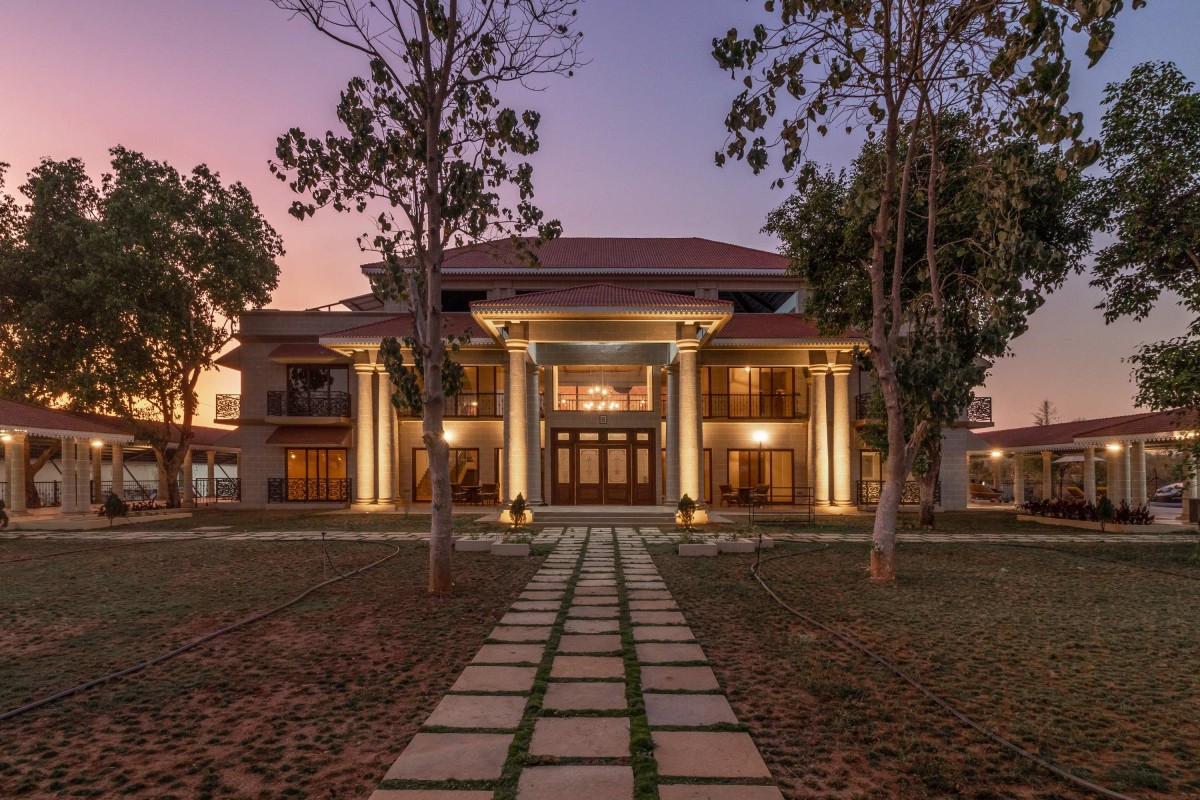 Dusk light exterior view of The Farmhouse by Oris Architects