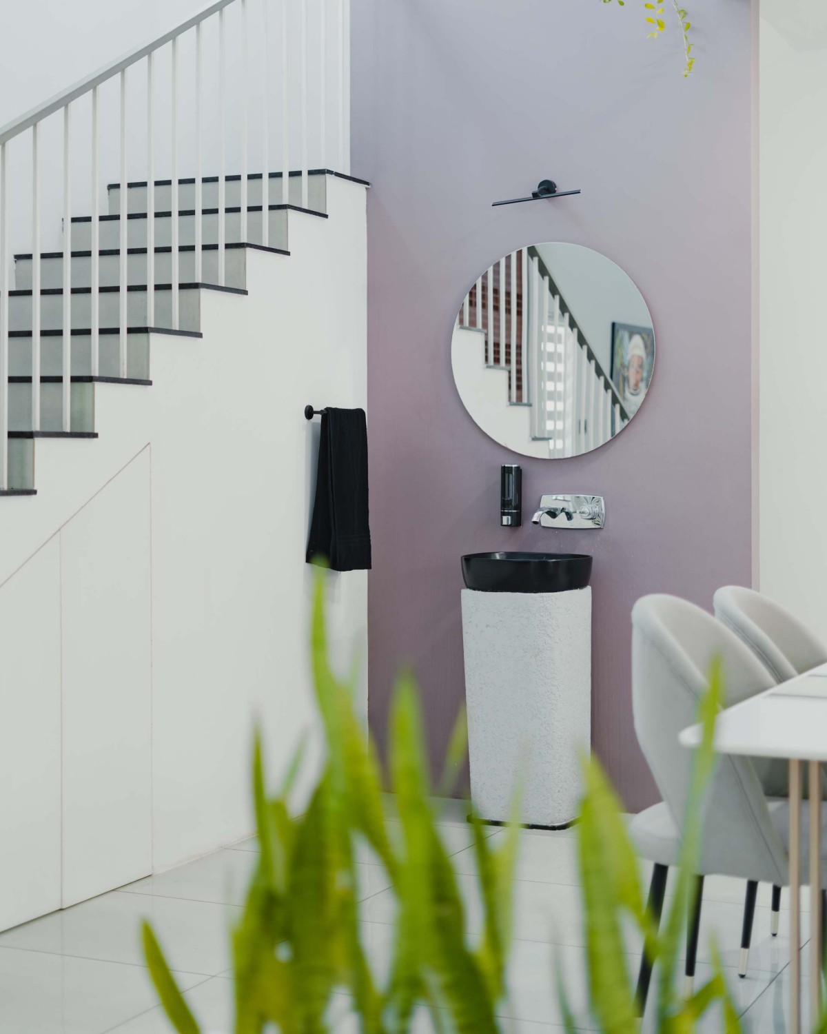 Staircase and wash basin of Linear Abode by Wide Architects Design Lab