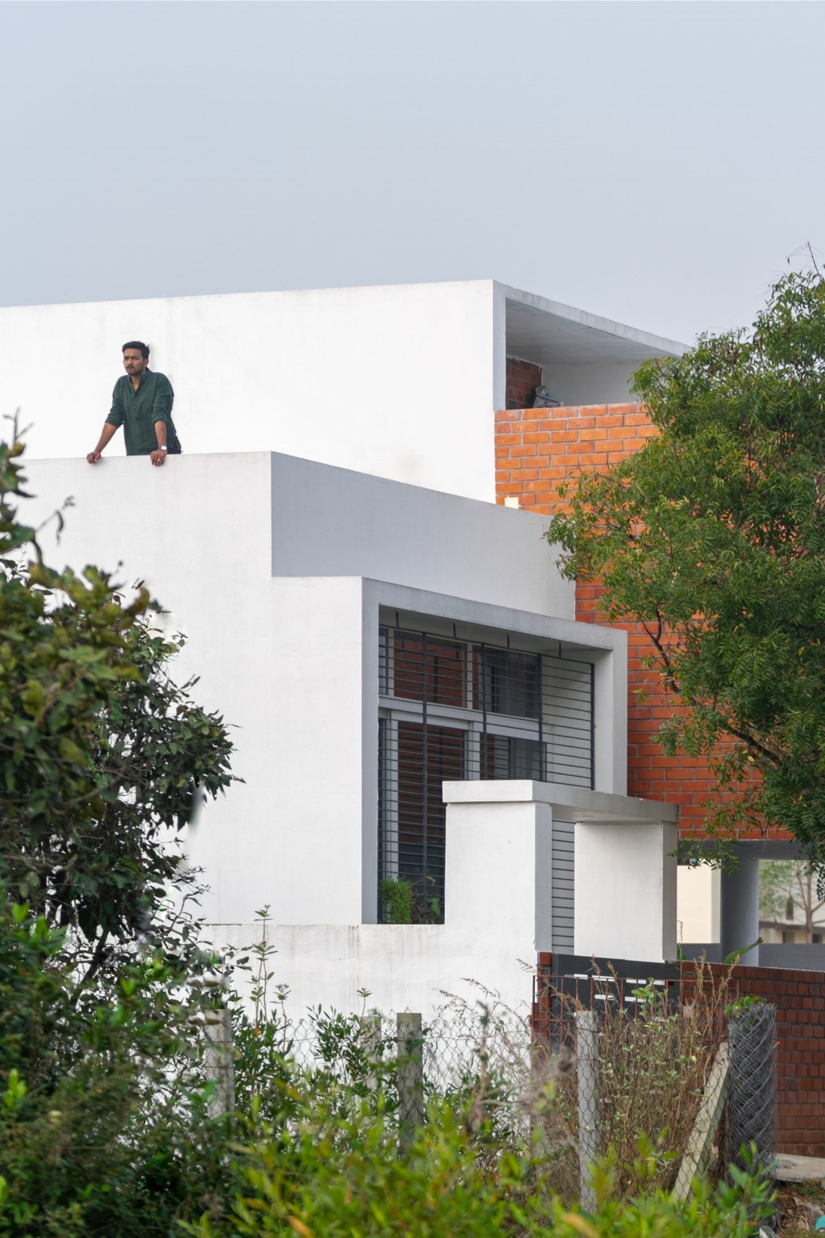 House nestled within the local existing vegetation