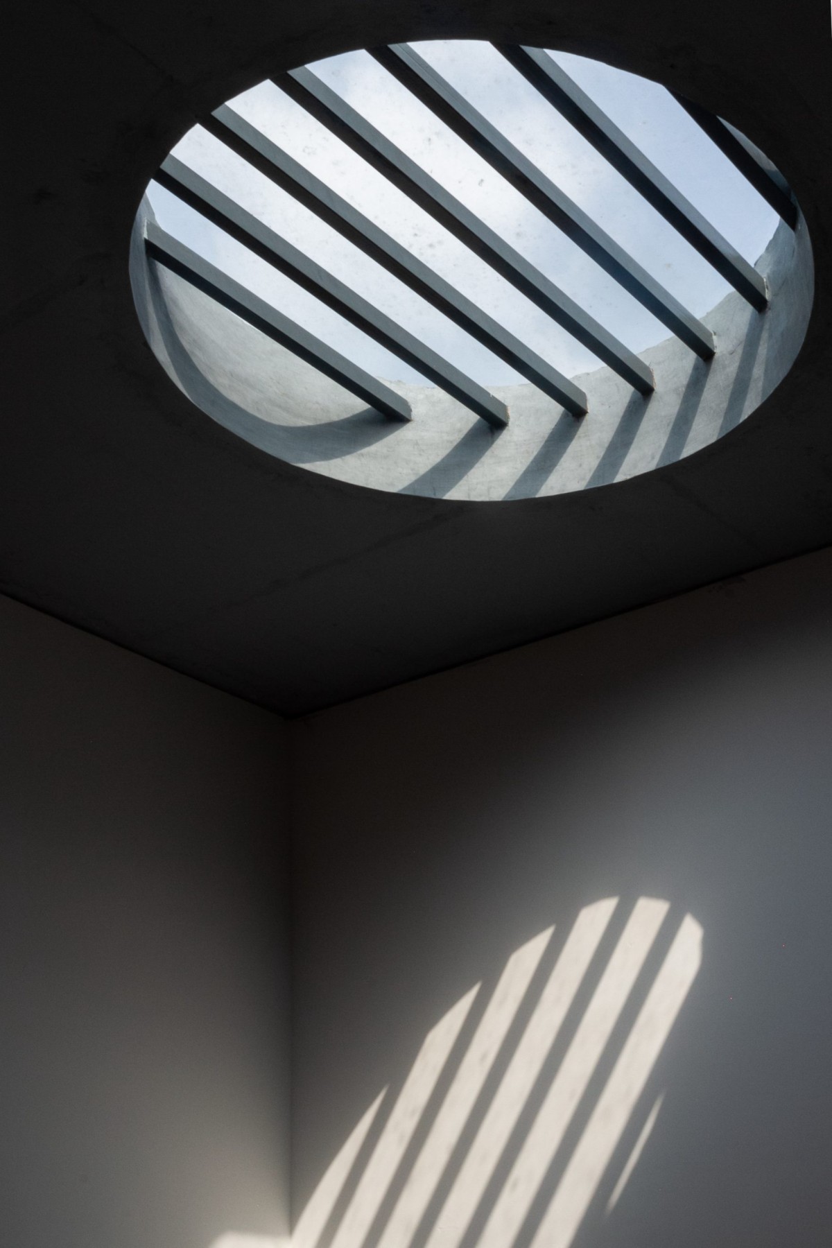 Skylights from roof creating everchanging play of shadows inside the house