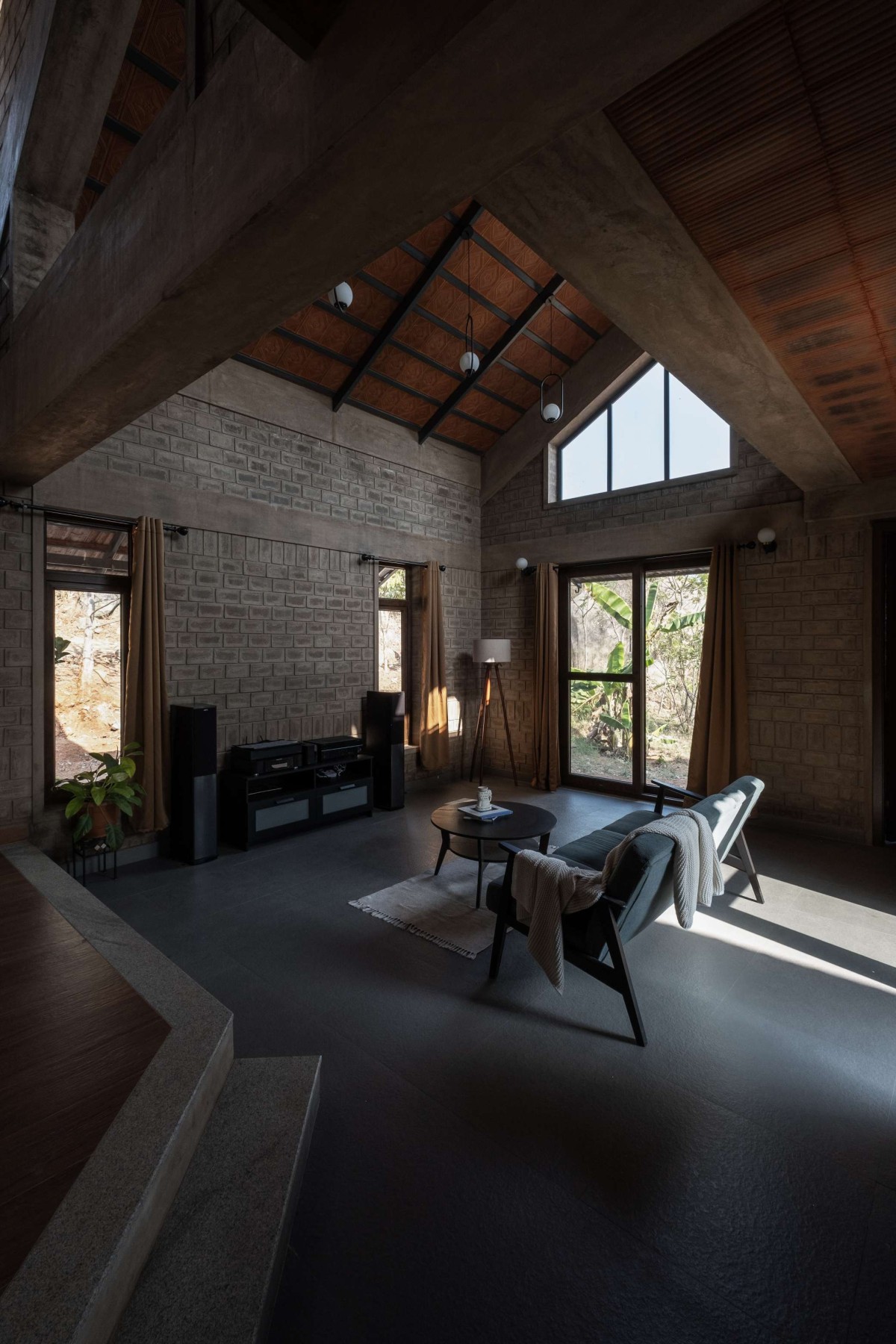 Living room of Boulder House by HabitArt Architecture Studio