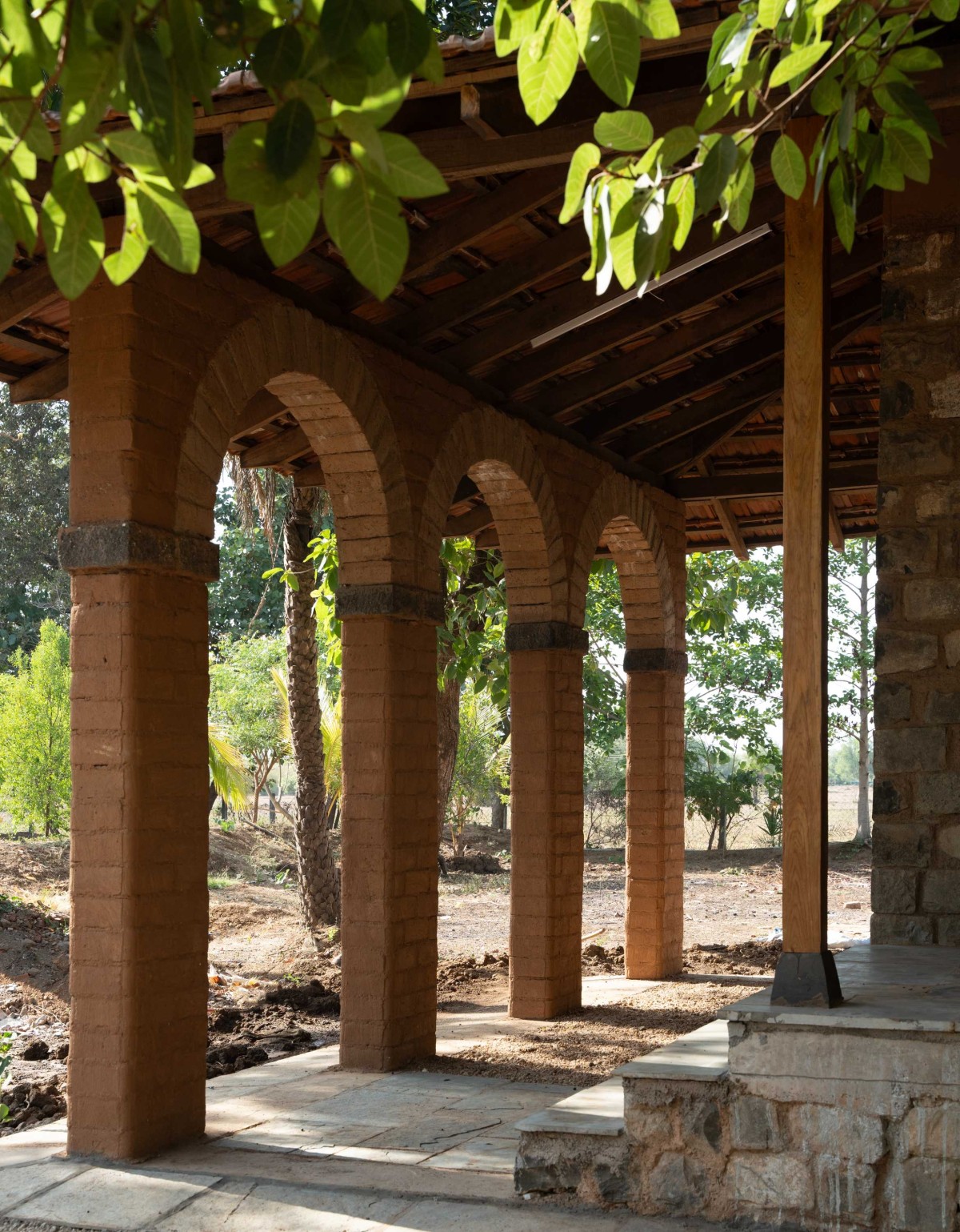 Arches at the west of House of Reclaimed Gold by Out Of The Box