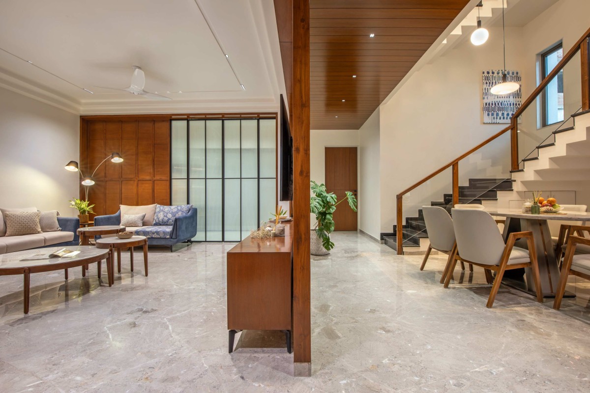 Living and Dining of Pramukh Villa by Foresight Associates