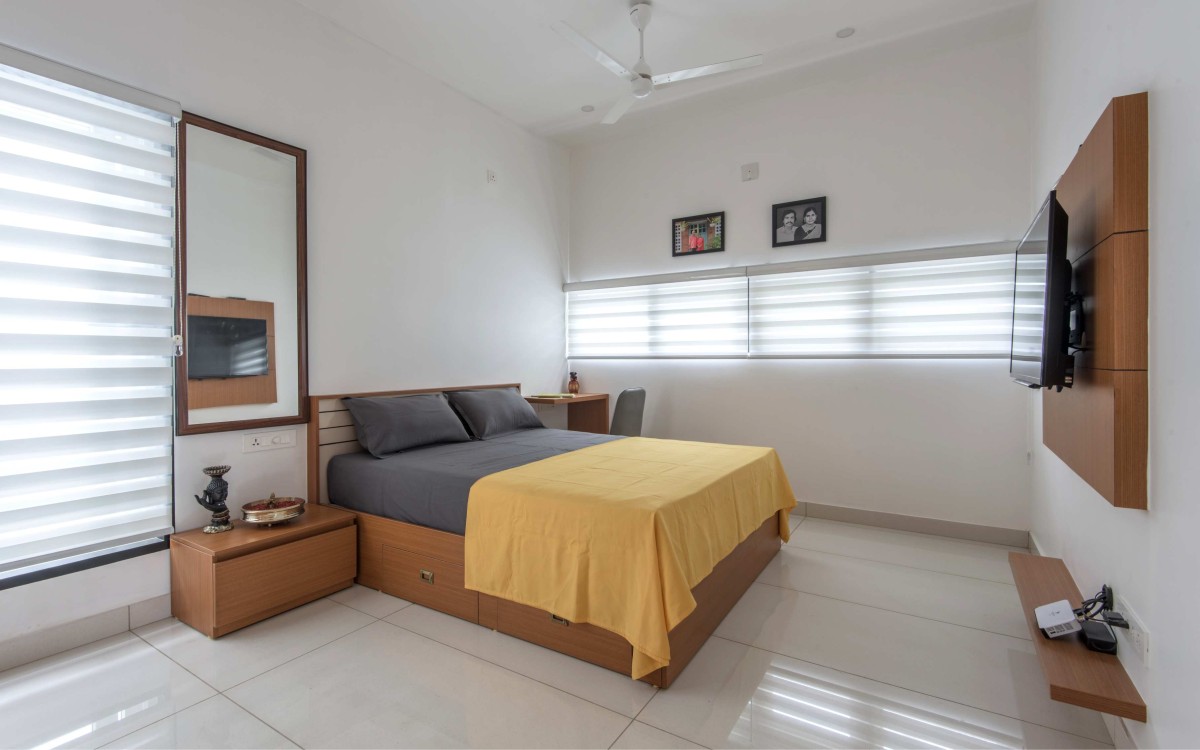 Bedroom of Neelamalathodi by JAID Architect