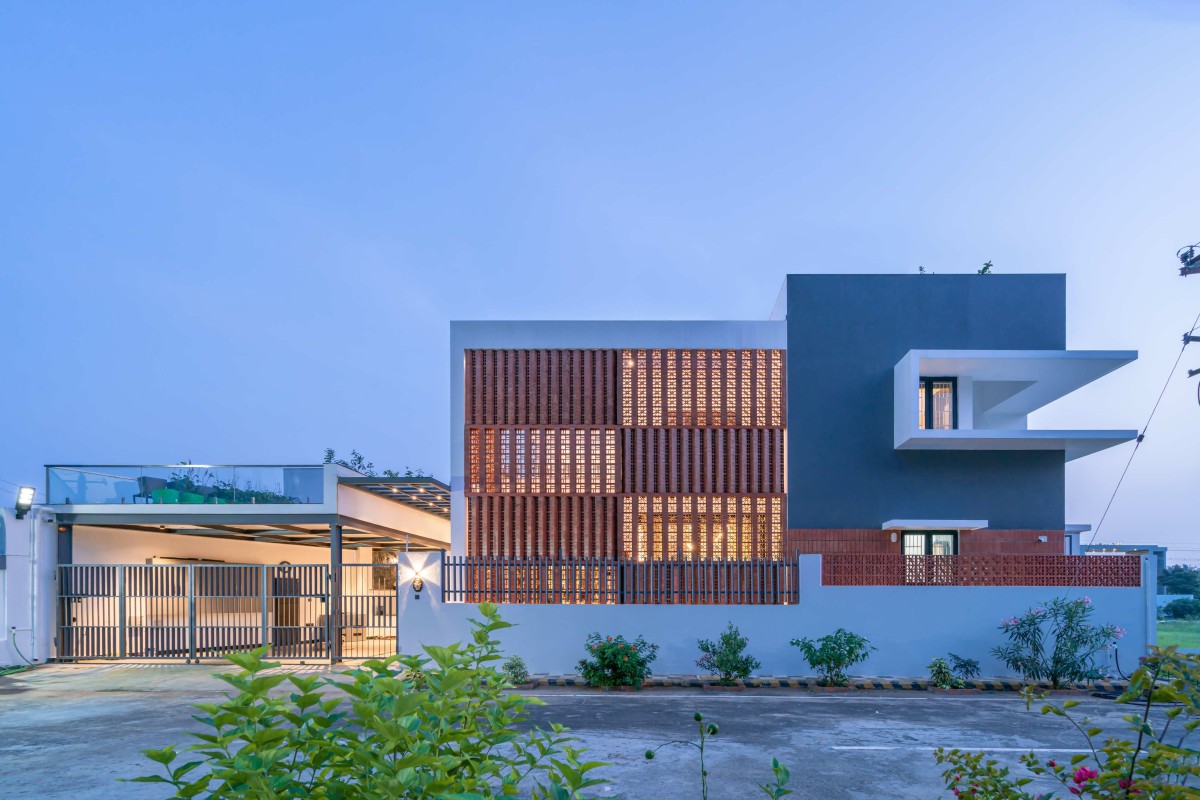 Dusk light exterior view of Terra Mask House by ARARCH Design Studio