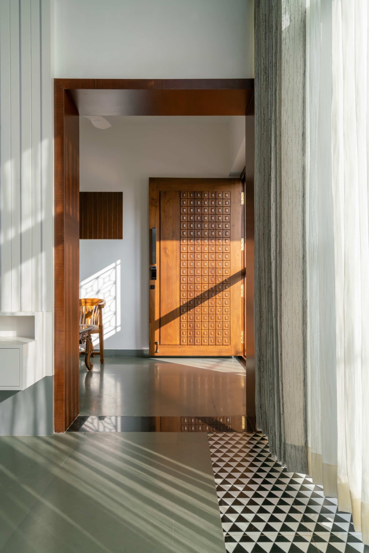 Passage to foyer of Terra Mask House by ARARCH Design Studio