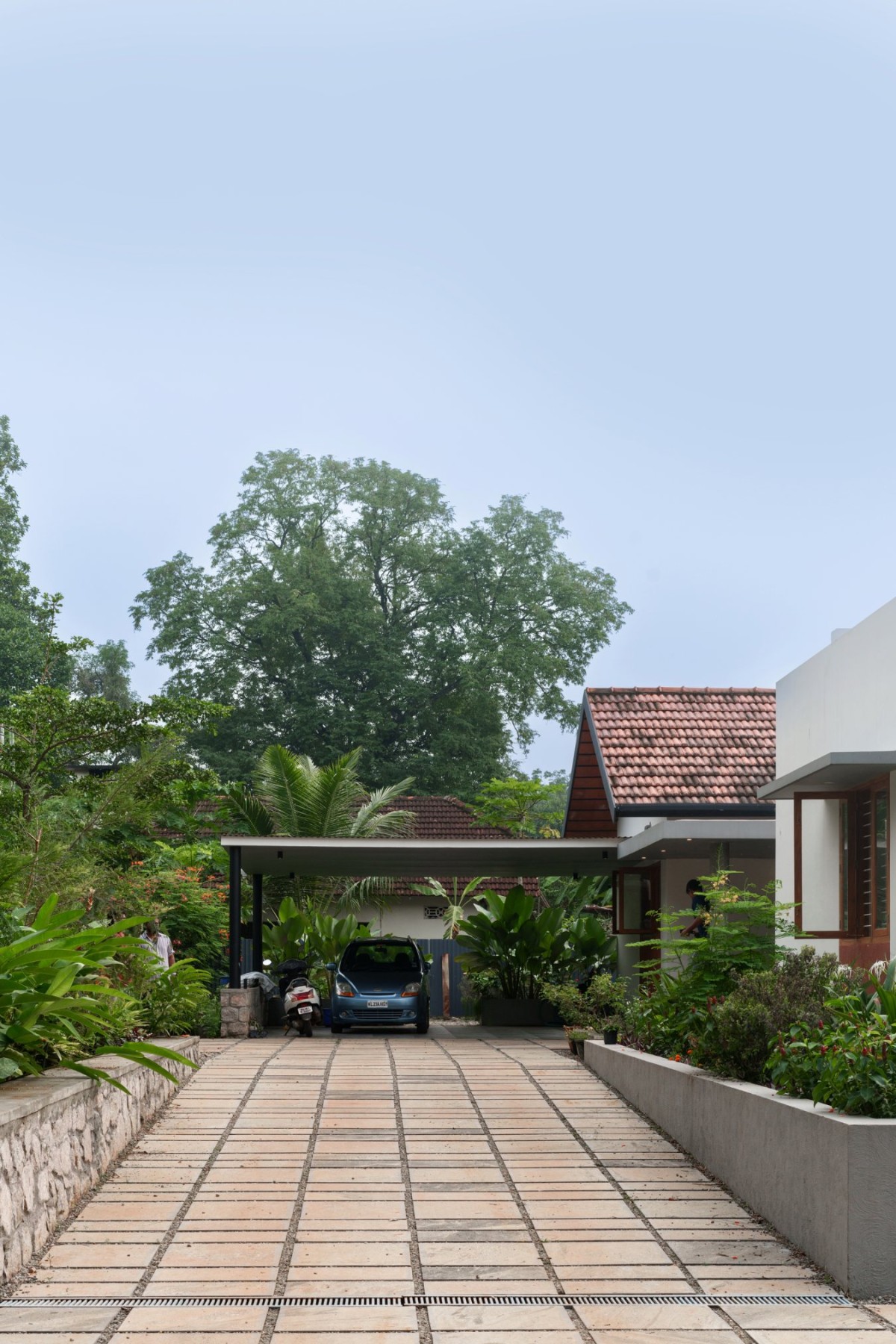 Car Porch of Inside-Out Residence by The Design Room