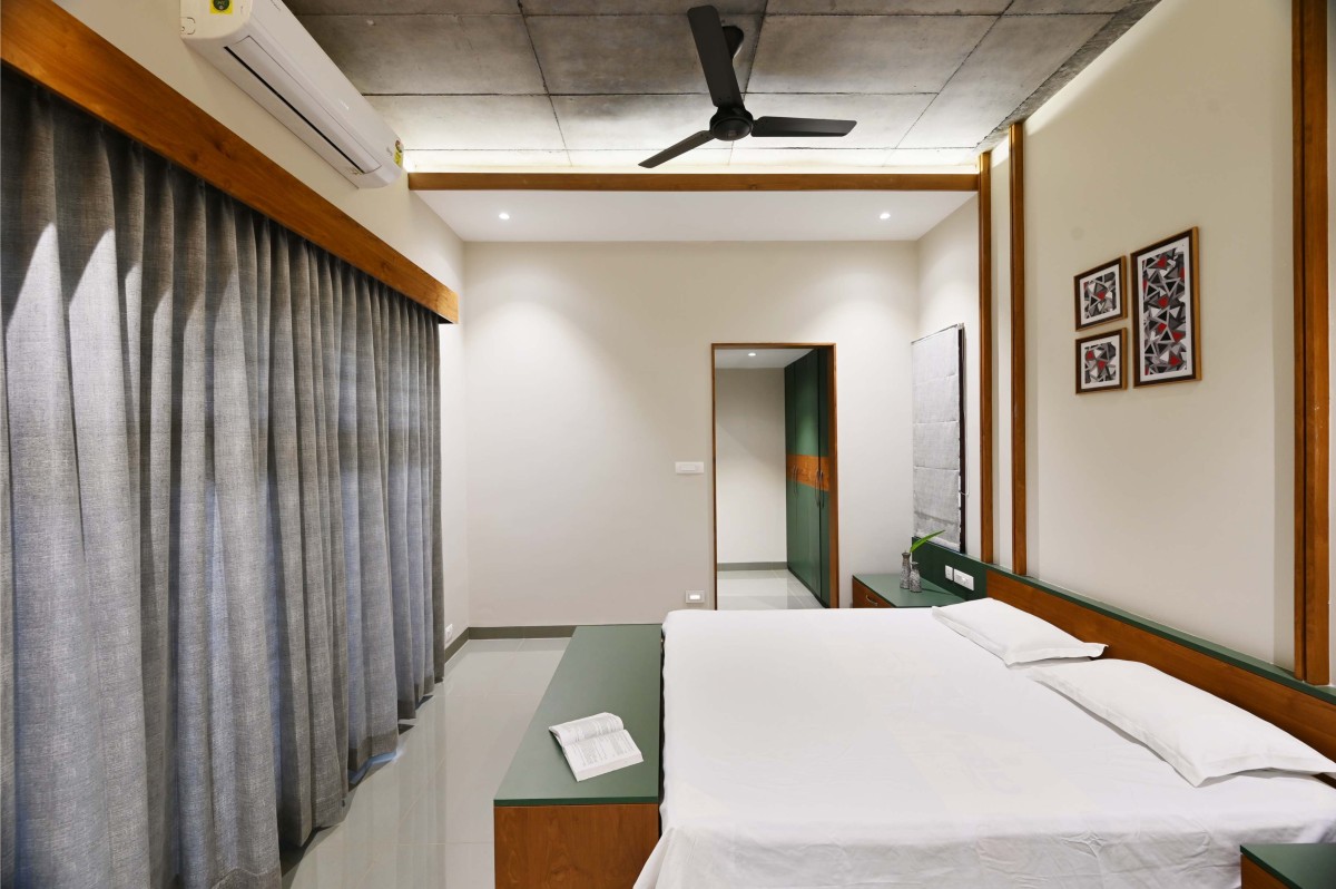 Bedroom 2 of Brick Screen House by HONEYCOMB Architects