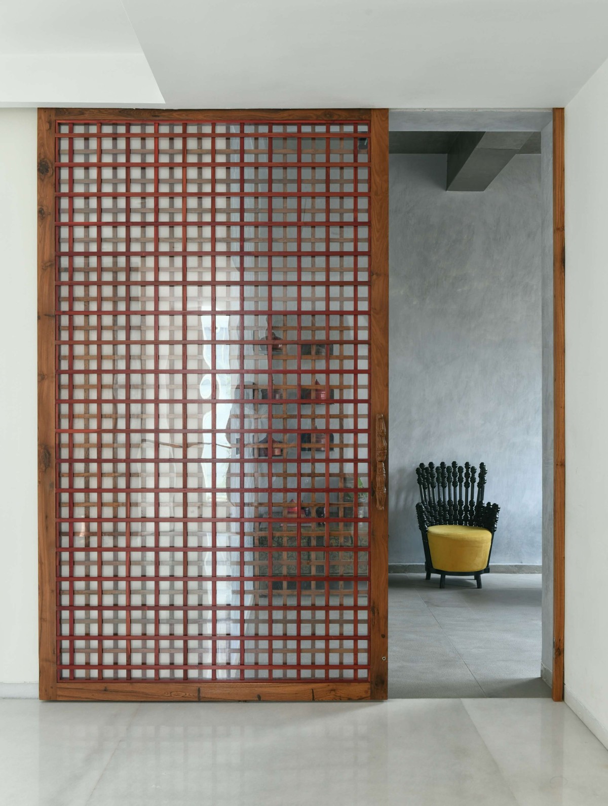 Detailed shot of teak beaded door of Dusk by Naav Studio