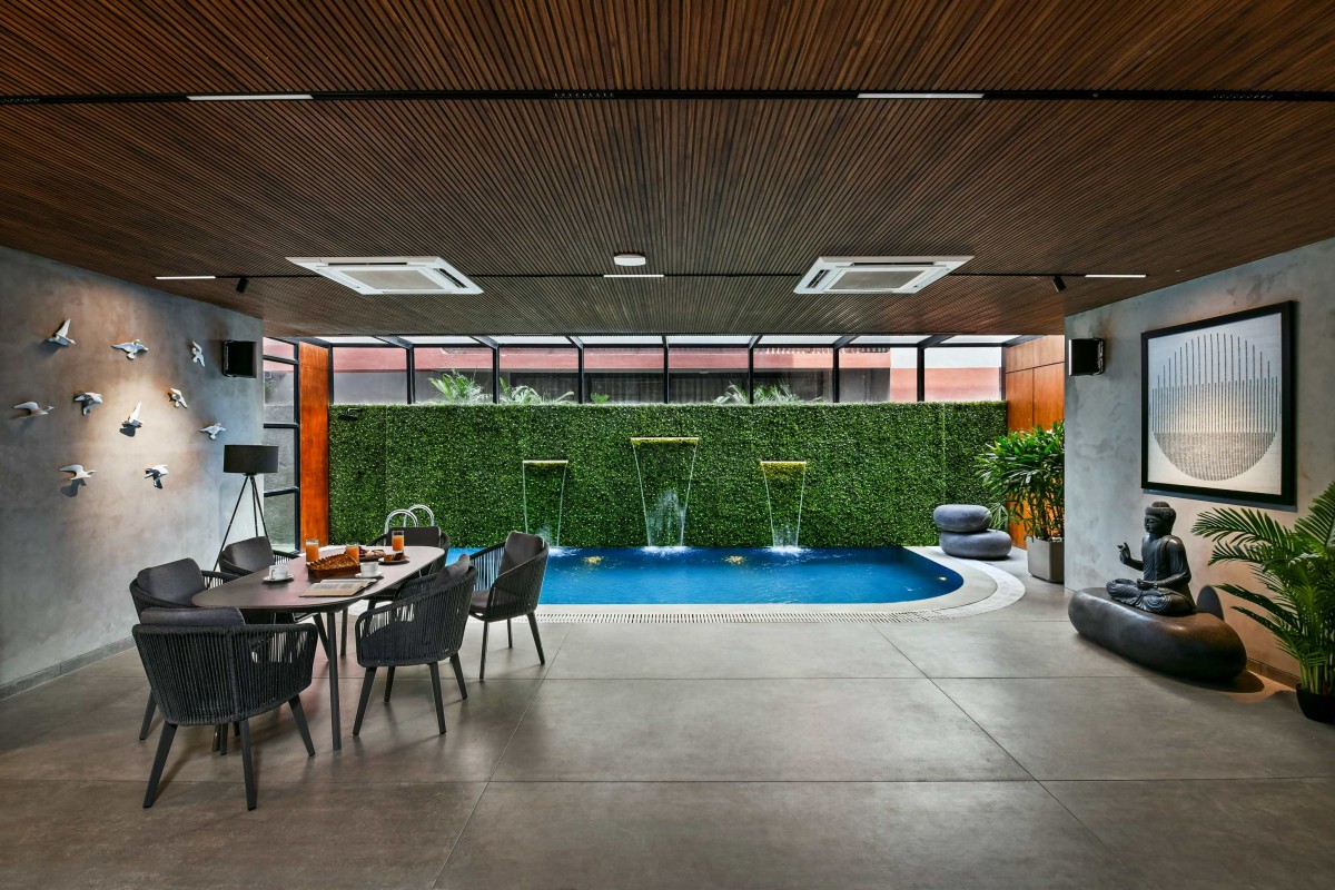 Dining and Pool area of The Second Home_ Vapi Villa by Icon Projects Inspace Pvt Ltd