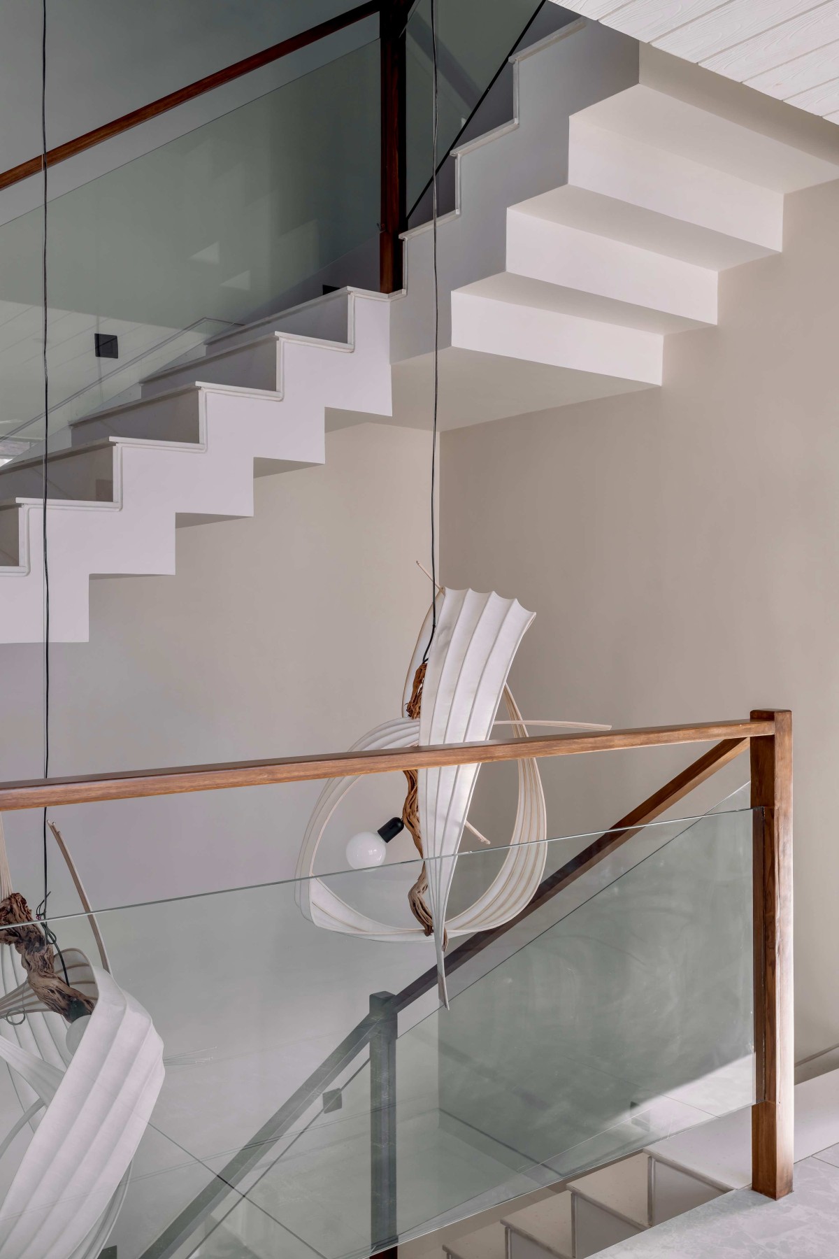 Staircase of Chainani House by Jagrut Shah Architect and Associates