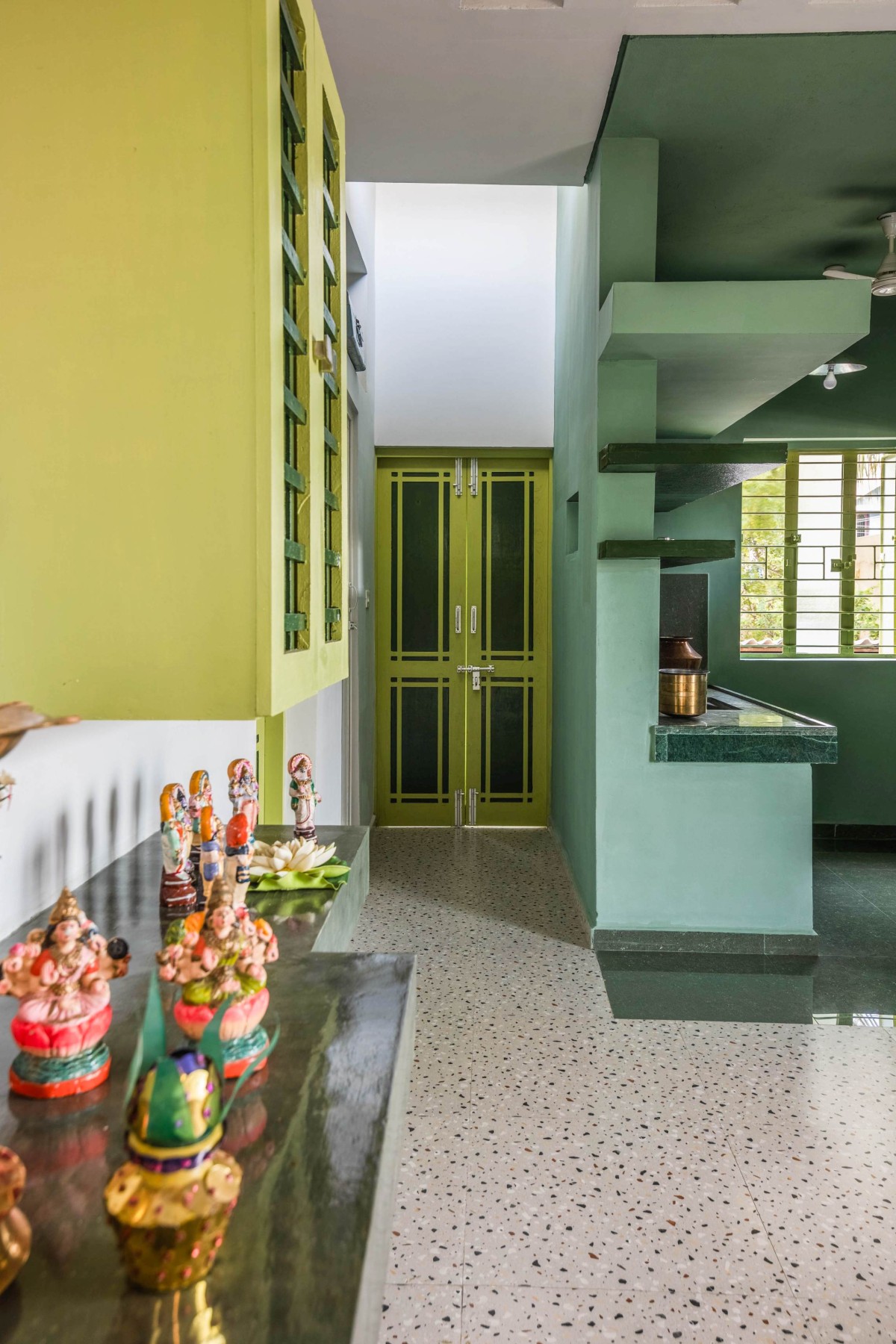 Passage to kitchen of Tint of Green by SomA.Architects