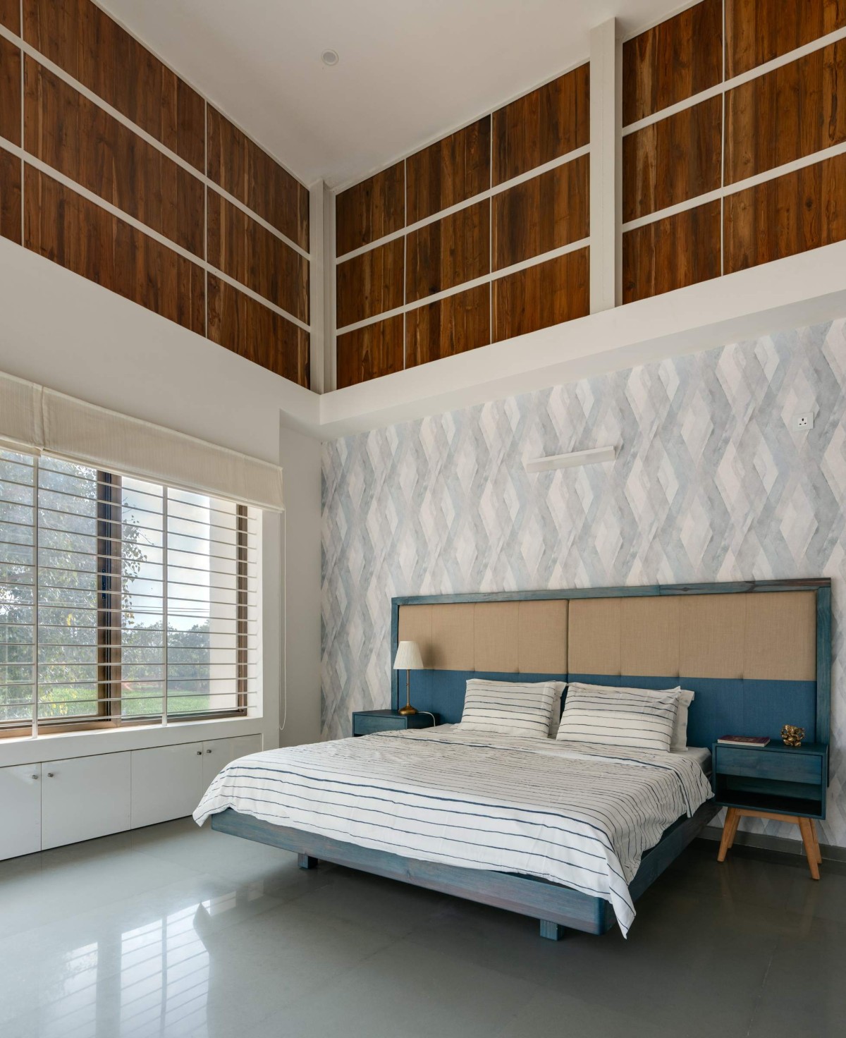 Double Height Son's Bedroom of The Modern Pastoral House by Sudaiva Studio