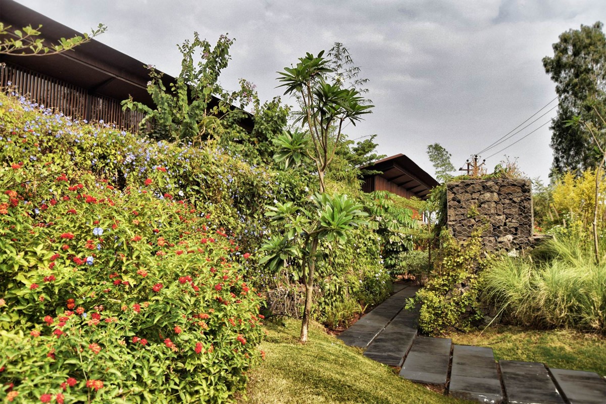 Entry passage of The House with the Gabion by SPASM Design Architects