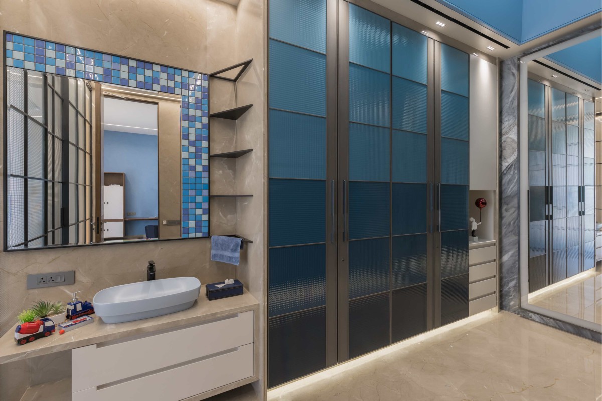 Son's Bathroom and Dressing room of Narola Villa by Essteam Design Services LLP