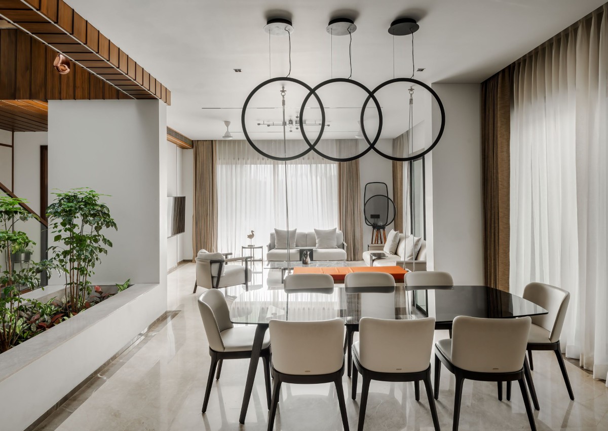 Dining area with a courtyard of Veera Villa by Keystone Studio