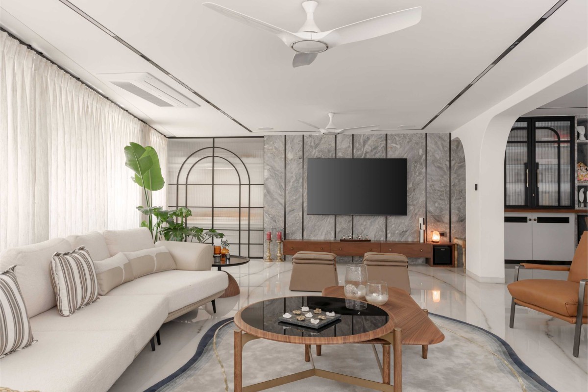 Living room of Kedia Bungalow by Plus V Architects