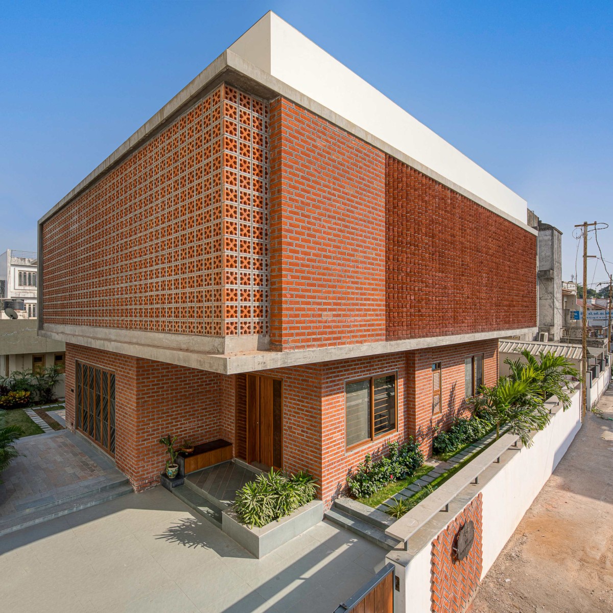 Exterior view of Brick Screen House by MS Design Studio