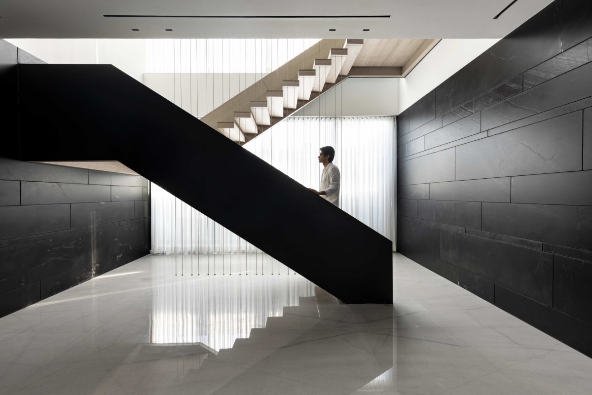 Staircase of RB 182 by Minimalist Architecture & Design Studio