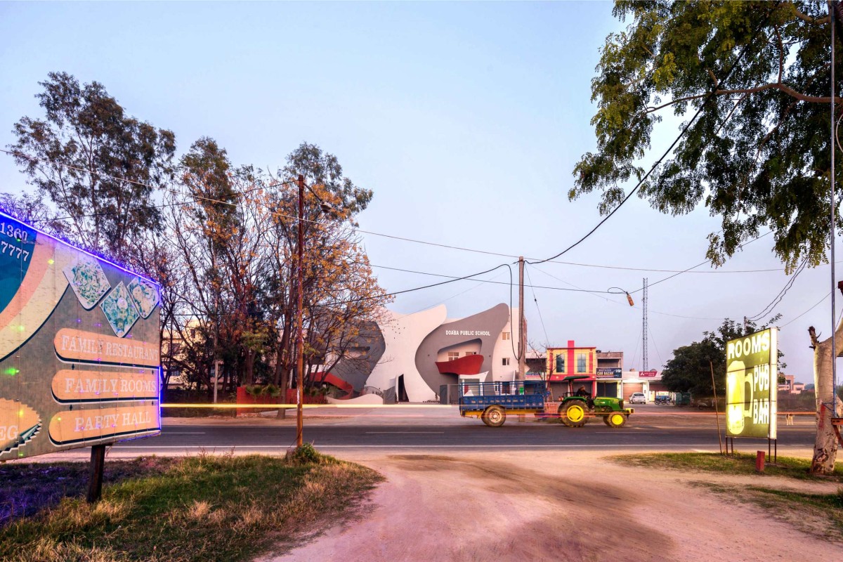 Dusk light exterior view of Doaba Public School by Studio Ardete