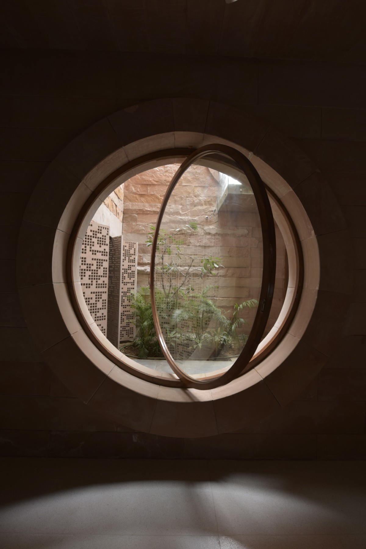 Courtyard view of Stone House by Malik Architecture