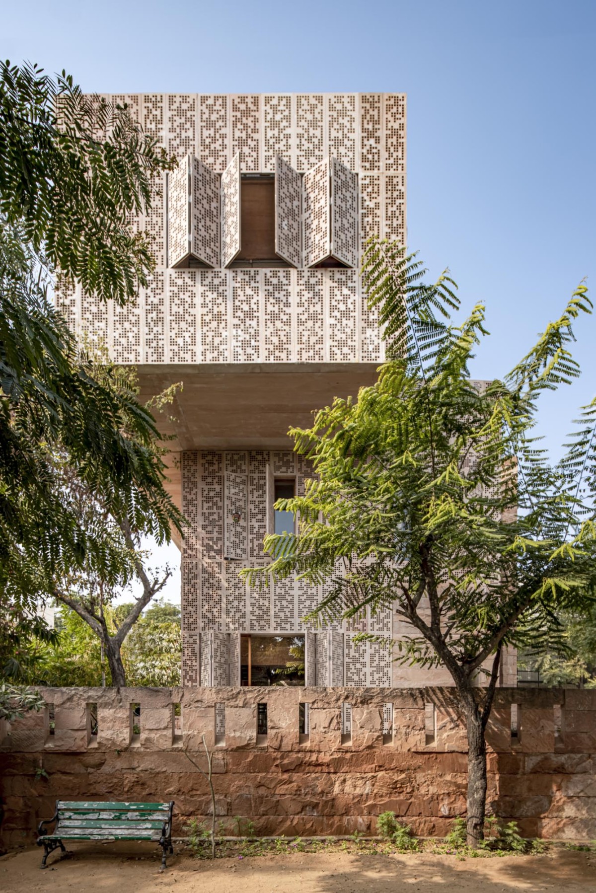 Exterior view of Stone House by Malik Architecture