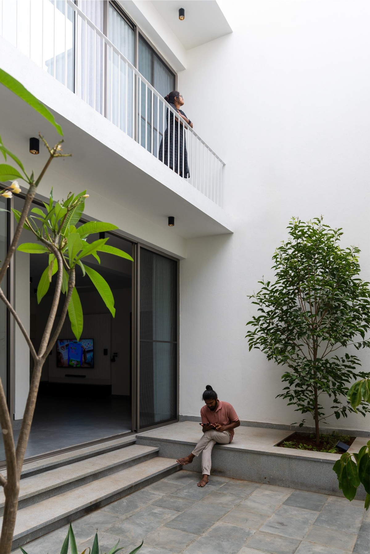 Courtyard of TT House by Wall Narratives