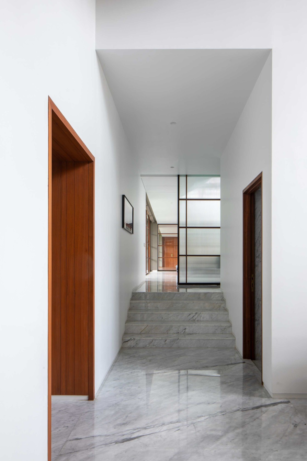 Corridor of Black Bastion House by SPASM Design Architects