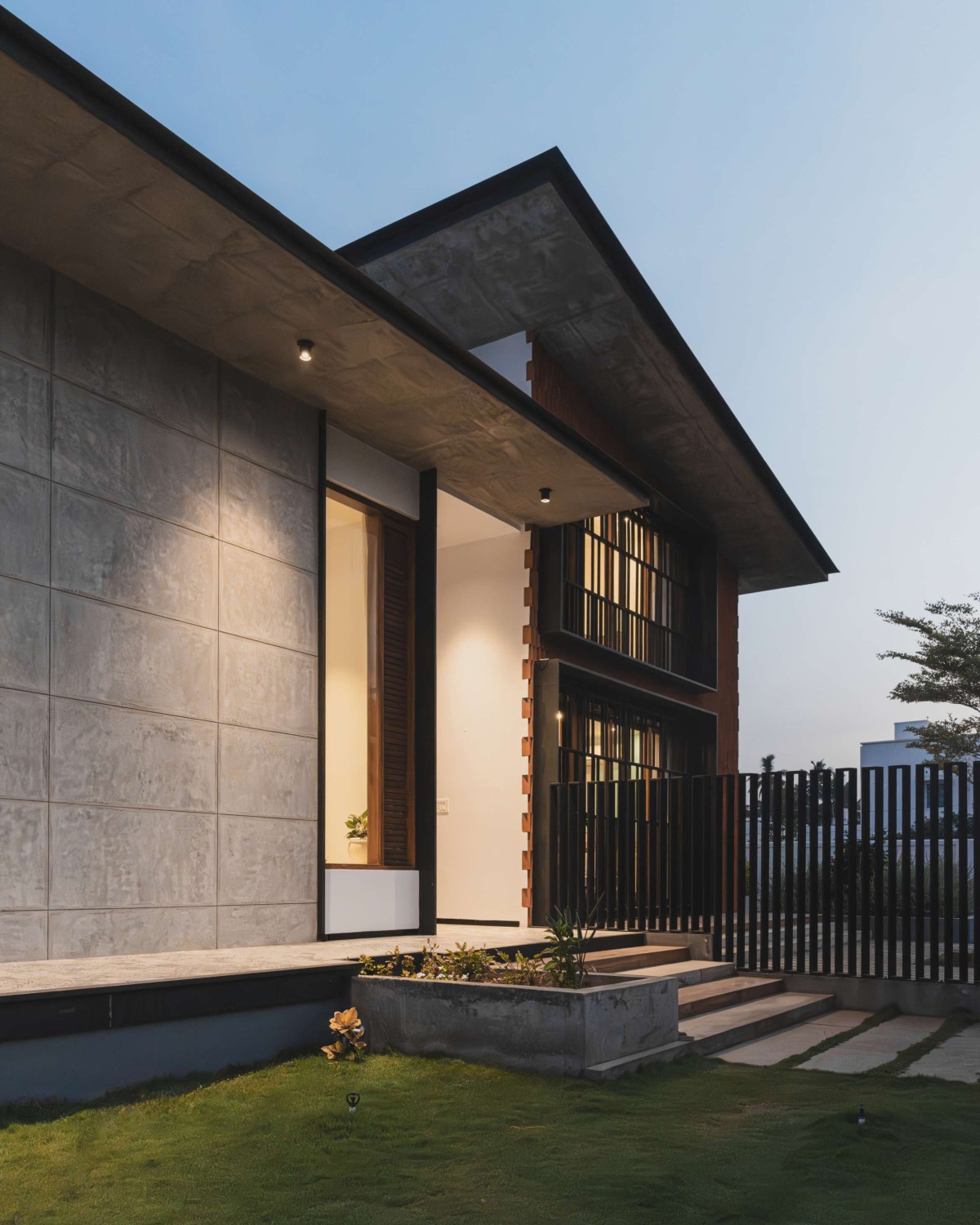 Dusk light exterior view of A House In The Farm by Studio MOB