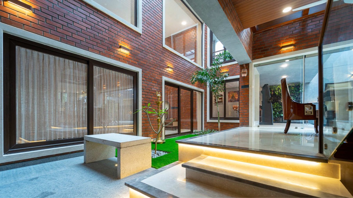 Pooja Court of Vinod Residence by Murali Architects