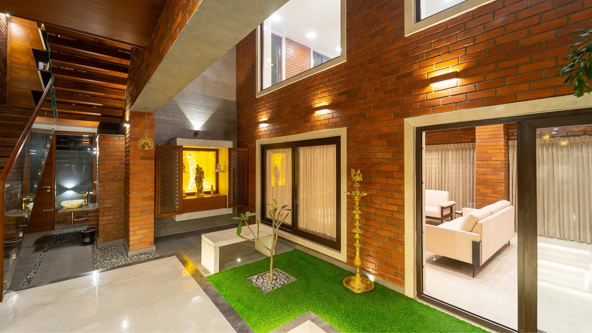 Pooja Court of Vinod Residence by Murali Architects