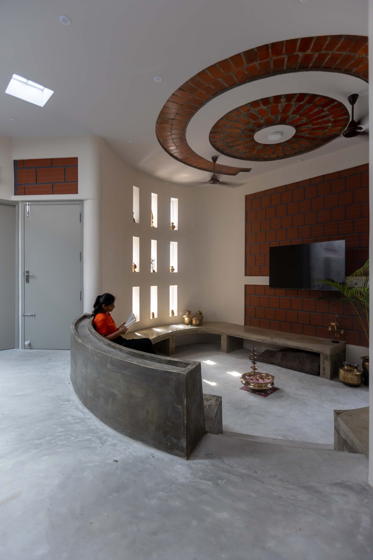 Living area of Red House by Kosh Studios