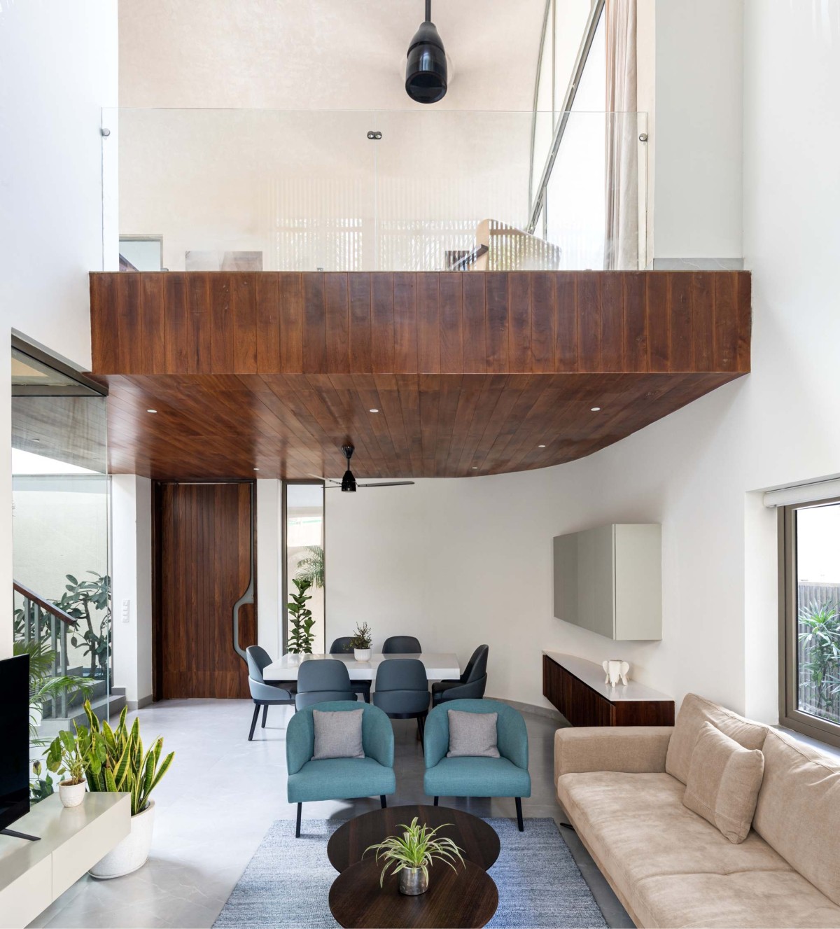 Double Height Living Area of Vault House by Sifti Design Studio