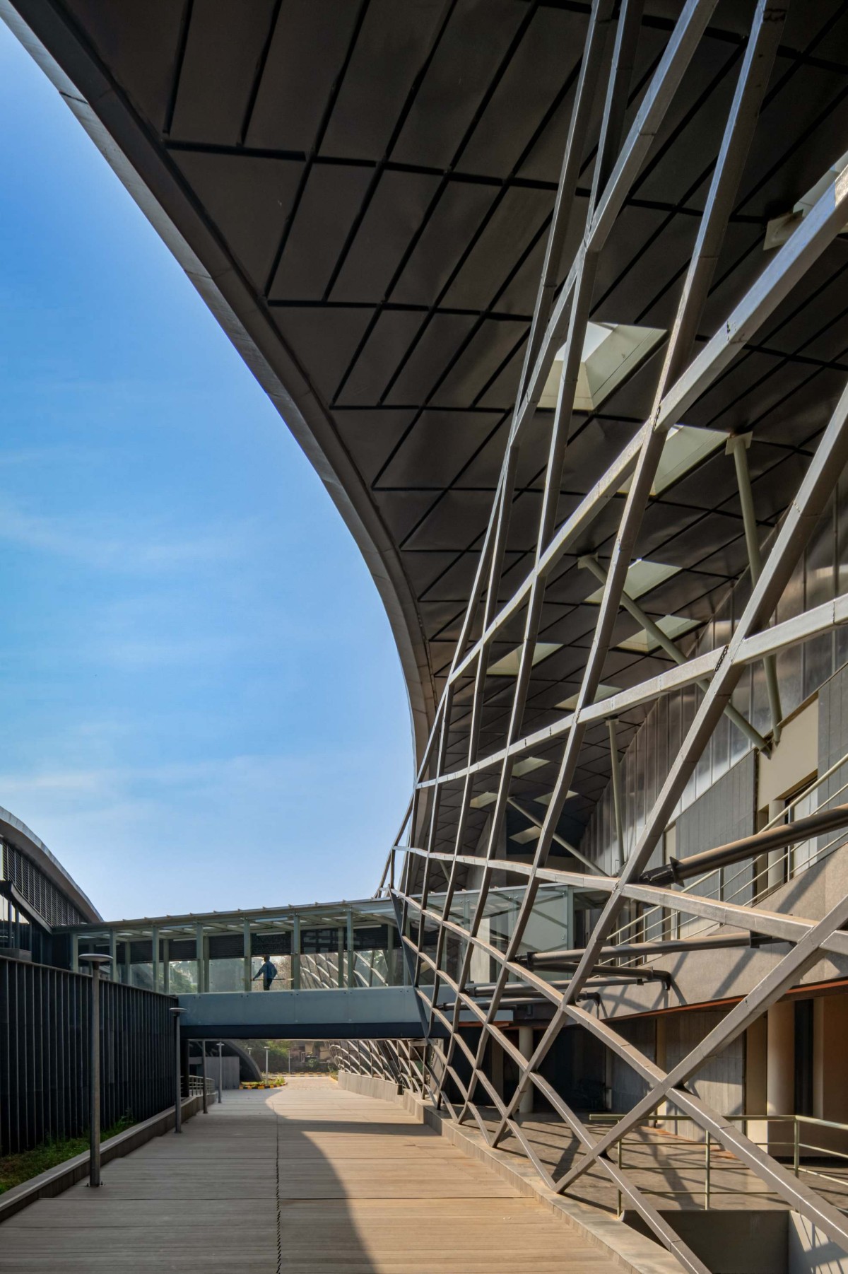 Outdoor passage view of National Institute of Water Sports by MOFA Studio