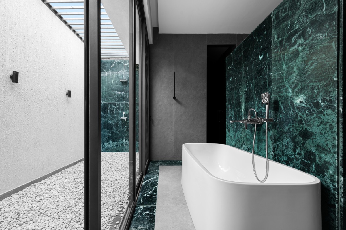 Bathroom of House of Mango Shadows by Design i.O Architects