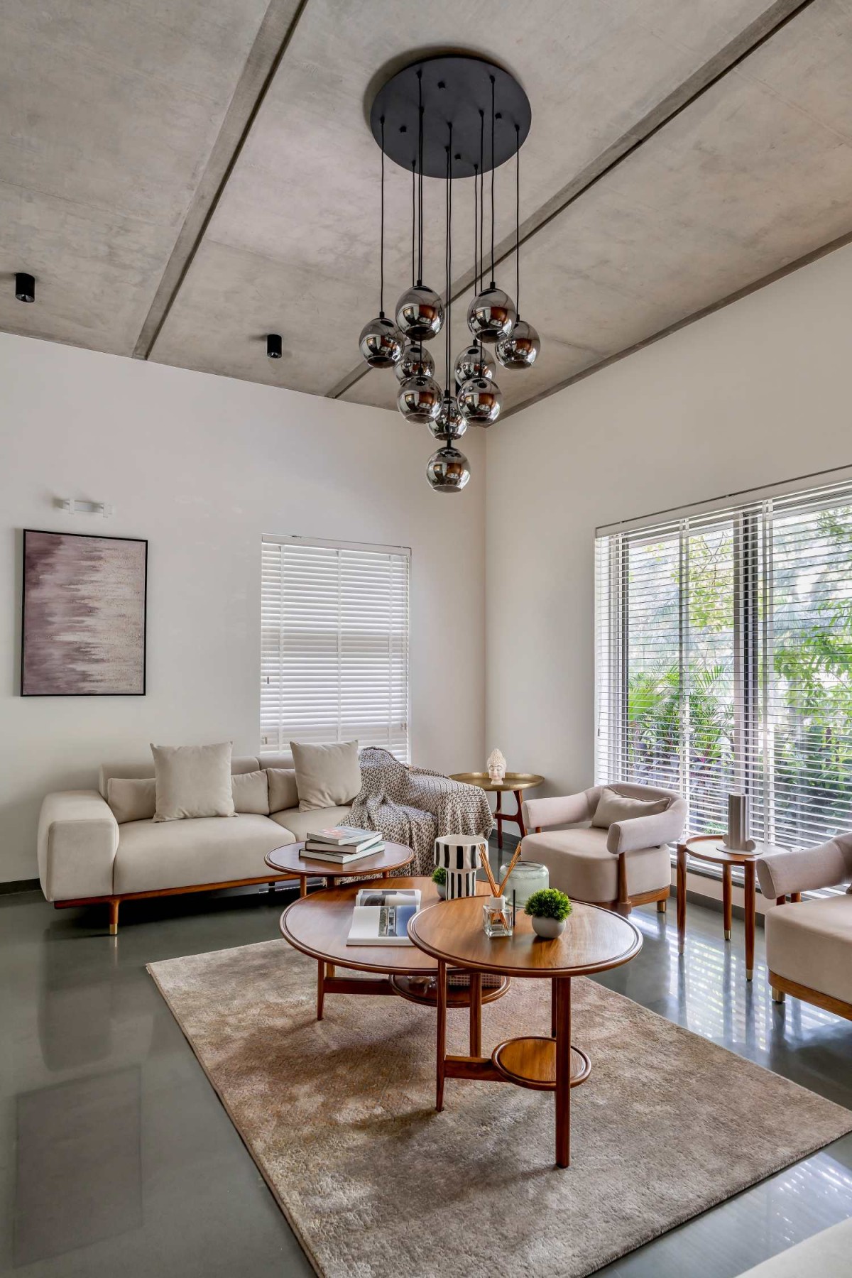 Living room of Jain Residence by Associated Architects (i) Pvt. Ltd.