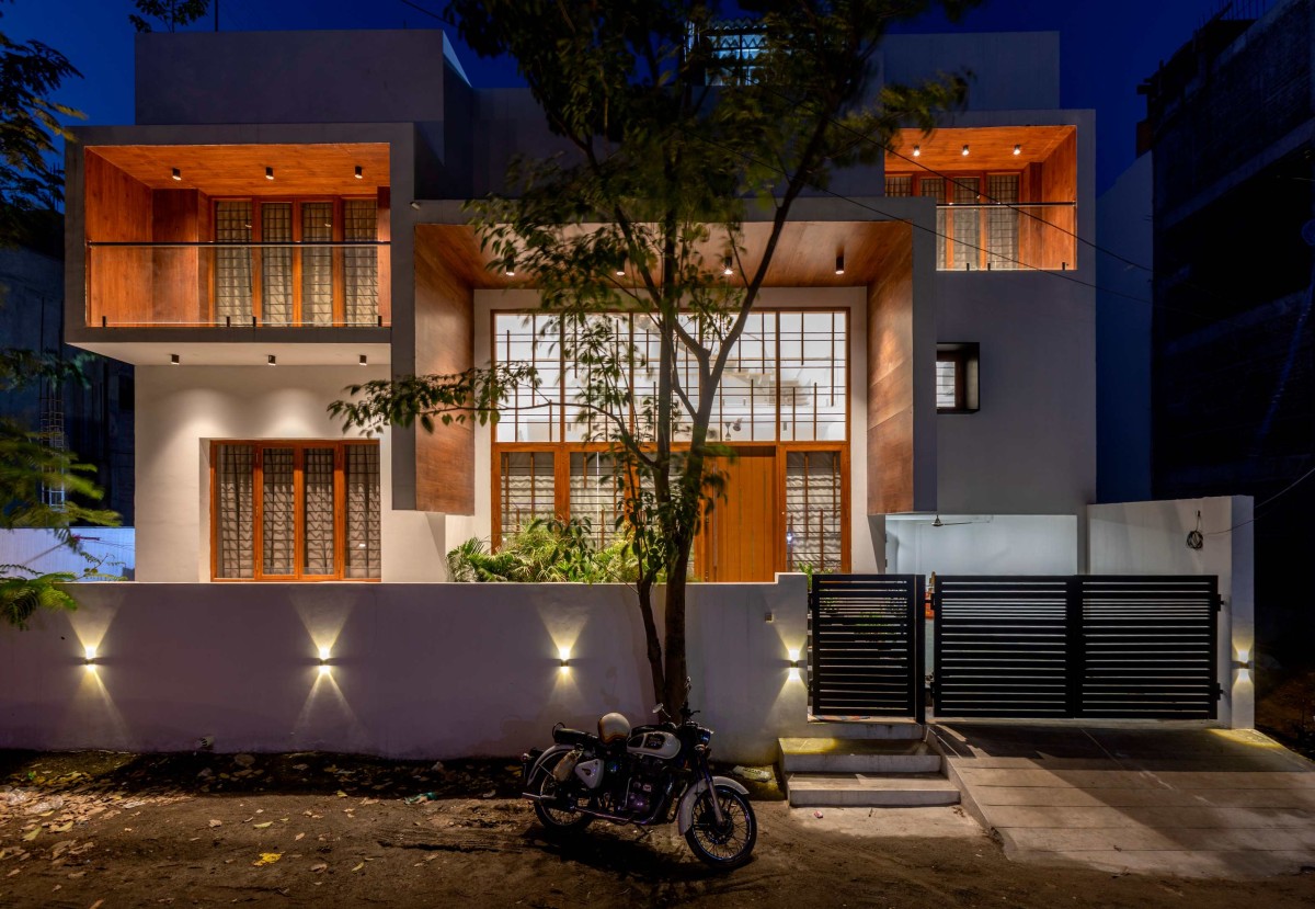 Dusk light exterior view of Level House by Ainthinai Projects