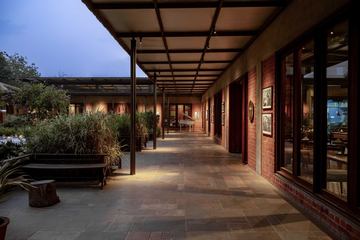 Outdoor lobby of Under The Neem Tree by Studio HPA