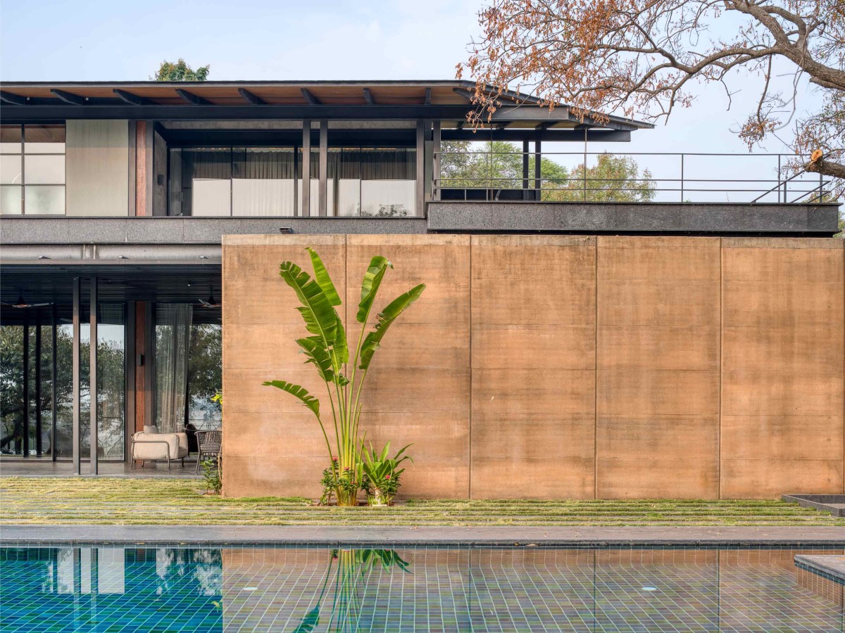 Pool view of Lake Shore House by SPASM Design Architects