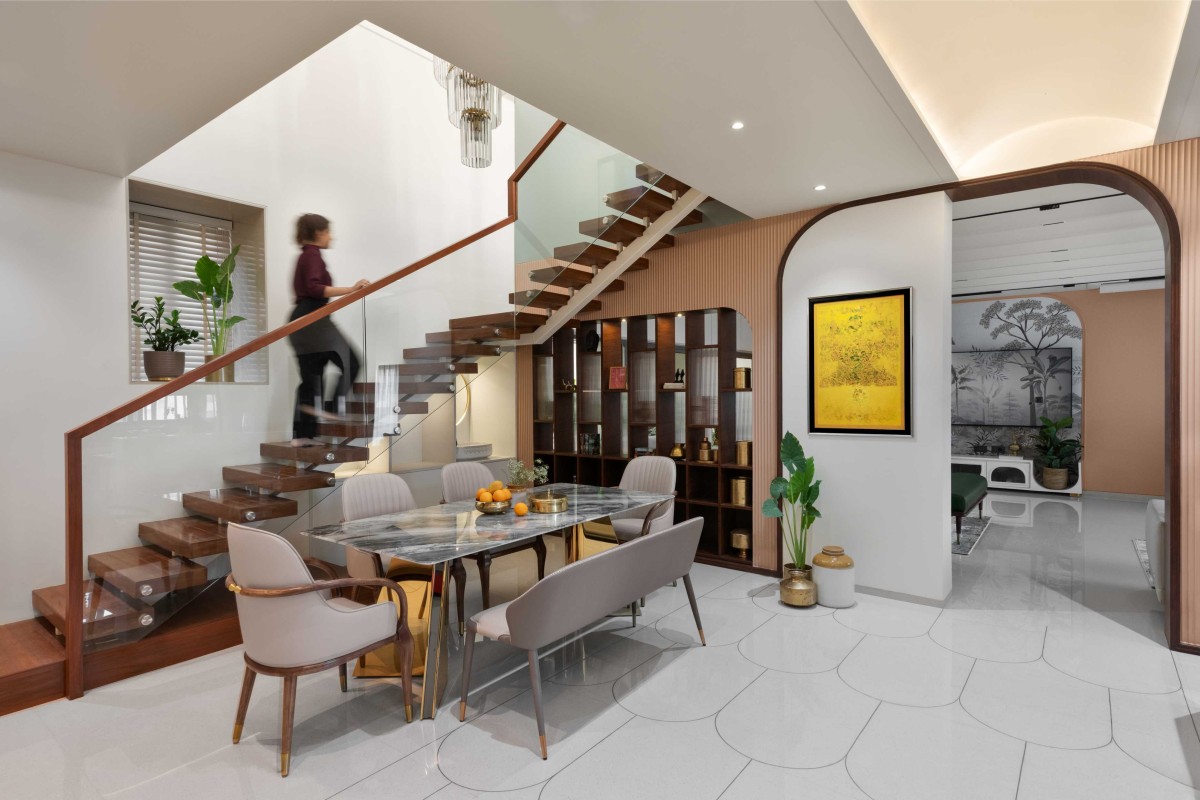 Dining & Staircase of The Arched Penthouse by The Design Alley