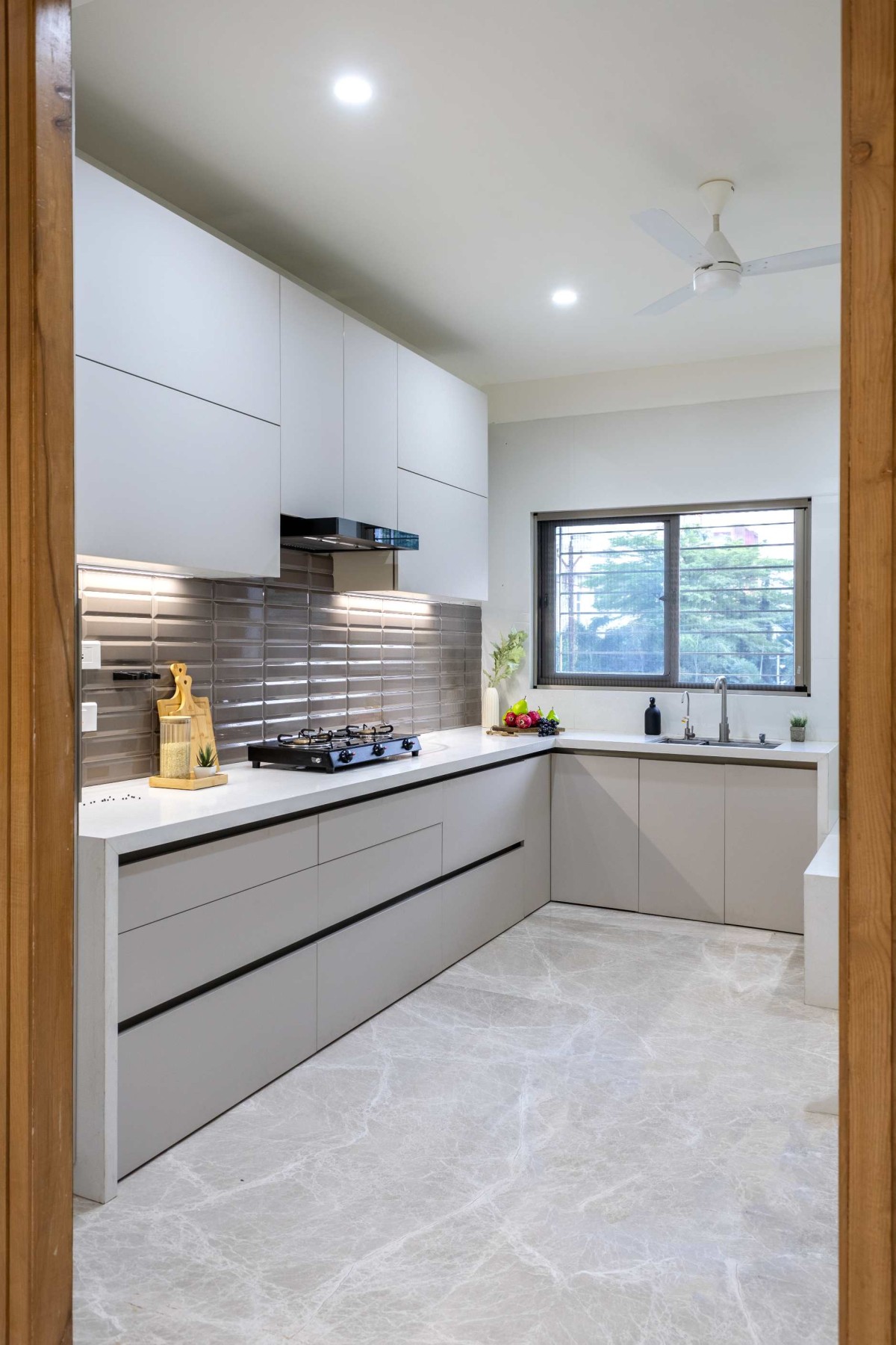 Kitchen of The Serene House by HM Design Studio