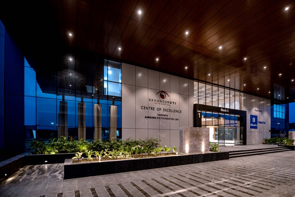 Night shot of entrance of Akhand Jyoti Eye Hospital Centre of Excellence by BuiltX Sustainable Design & Construction