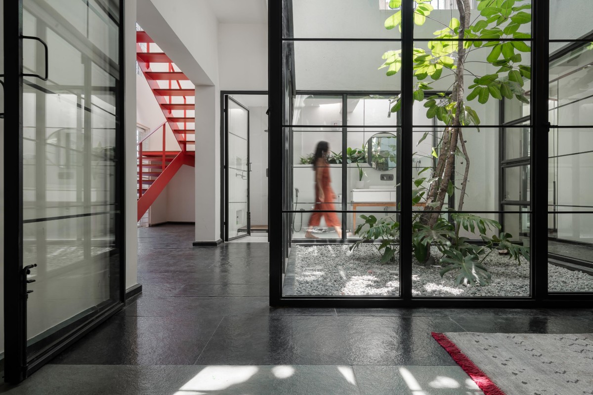 Passage to courtyard of Maya by Kamat & Rozario Architecture