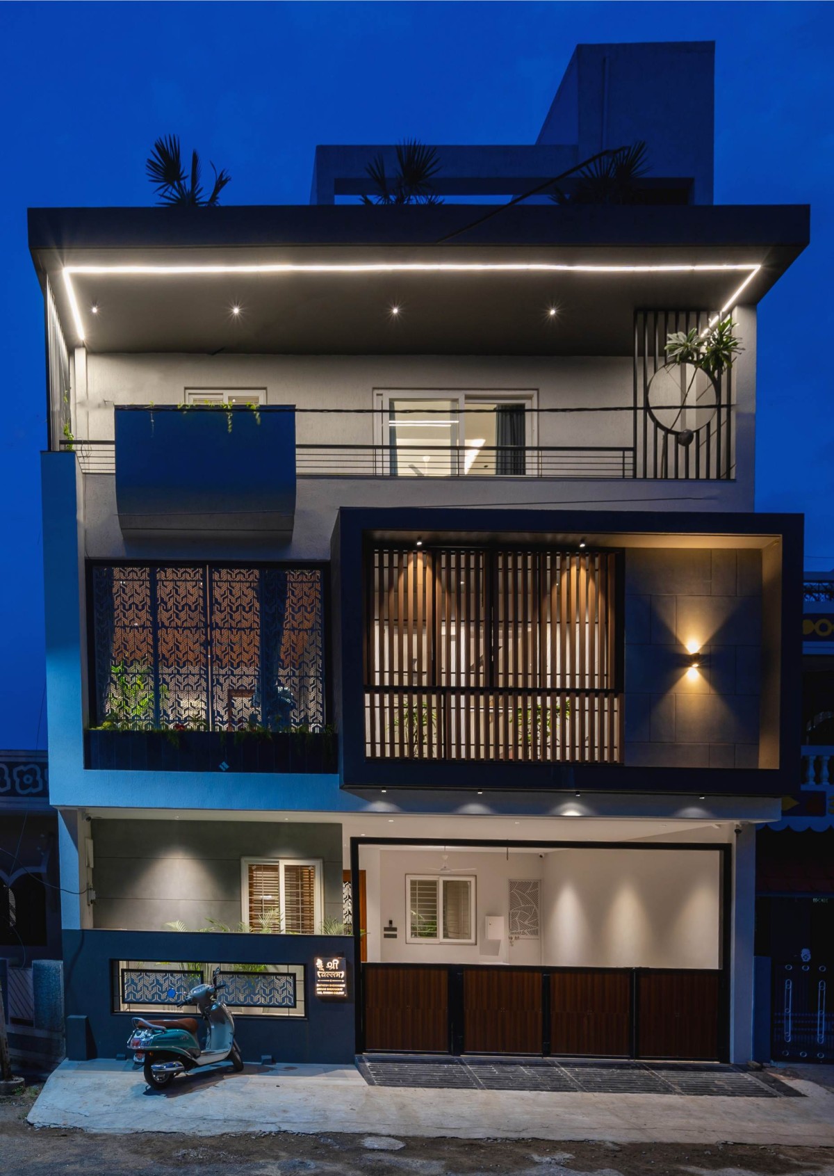 Night shot of exterior of The Screen House by Mohit Jain & Architects